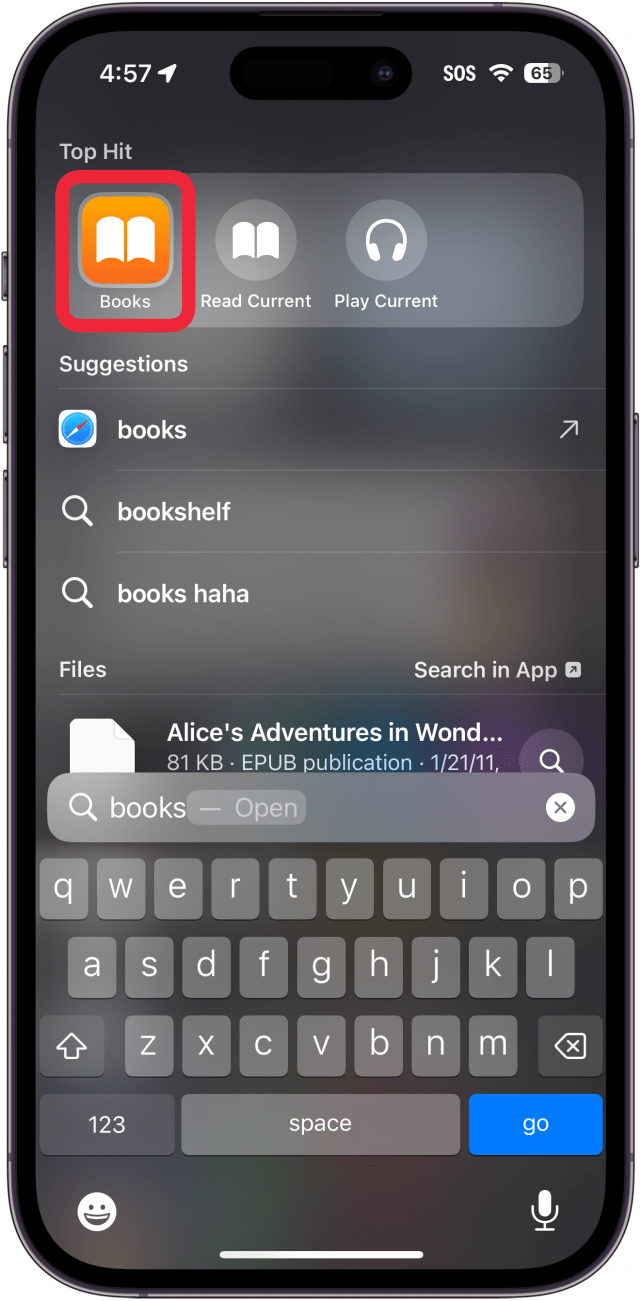 Pesquisa em destaque no iphone com uma caixa vermelha à volta da aplicação de livros