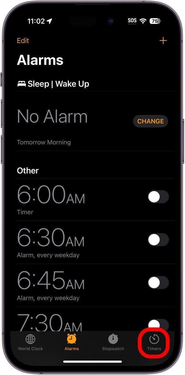 aplicação de relógio do iphone com separador de temporizadores circulado a vermelho