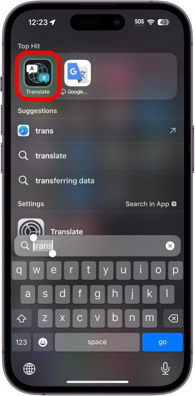 Recherche Spotlight sur l'iPhone avec l'application translate entourée en rouge