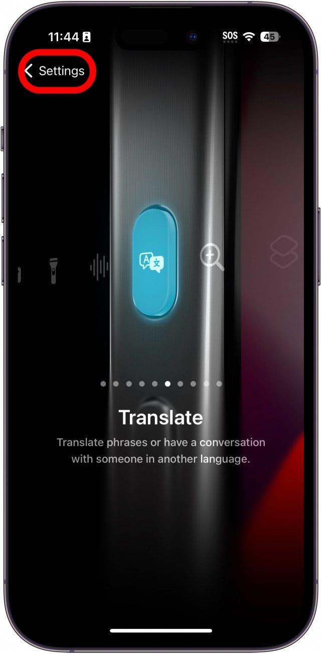 ajustes del botón de acción del iphone mostrando el icono de traducir con un recuadro rojo alrededor del botón de ajustes
