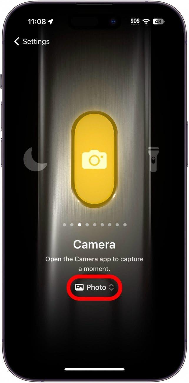Ajustes del botón de acción del iphone que muestra el ajuste de la cámara con Fotos rodeado de un círculo rojo