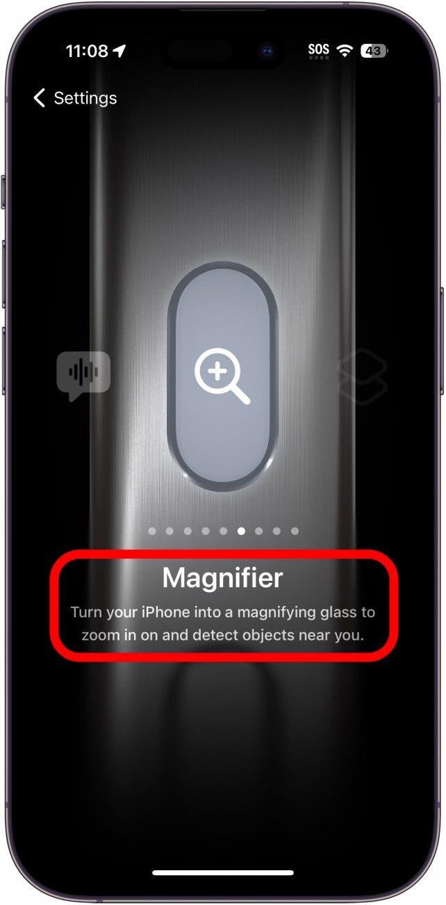 iphone actieknop instellingen toont de Vergrootglas instelling met een rode cirkel rond de beschrijving