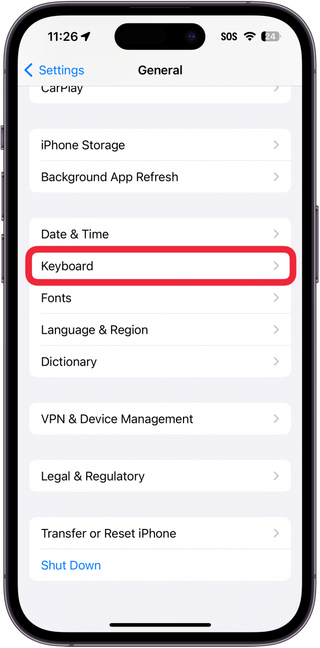 definições gerais do iphone com uma caixa vermelha à volta do teclado