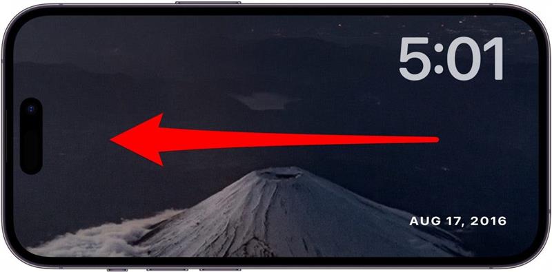 écran des photos en veille de l'iphone avec une flèche rouge pointant vers la gauche de l'écran, indiquant qu'il faut balayer l'écran vers la gauche